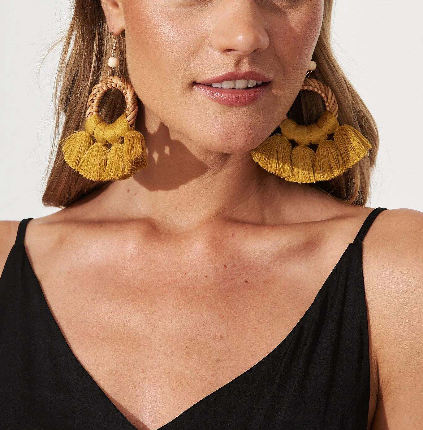 Drop Tassel Earrings In Mustard